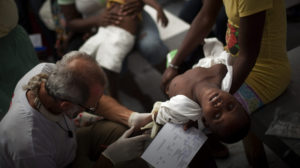 A young cholera victim in a Gonaïves hospital in November 2010 as UN-introduced cholera was exploding in Haiti. Today, Haitian cholera victims want “eradication and compensation.”