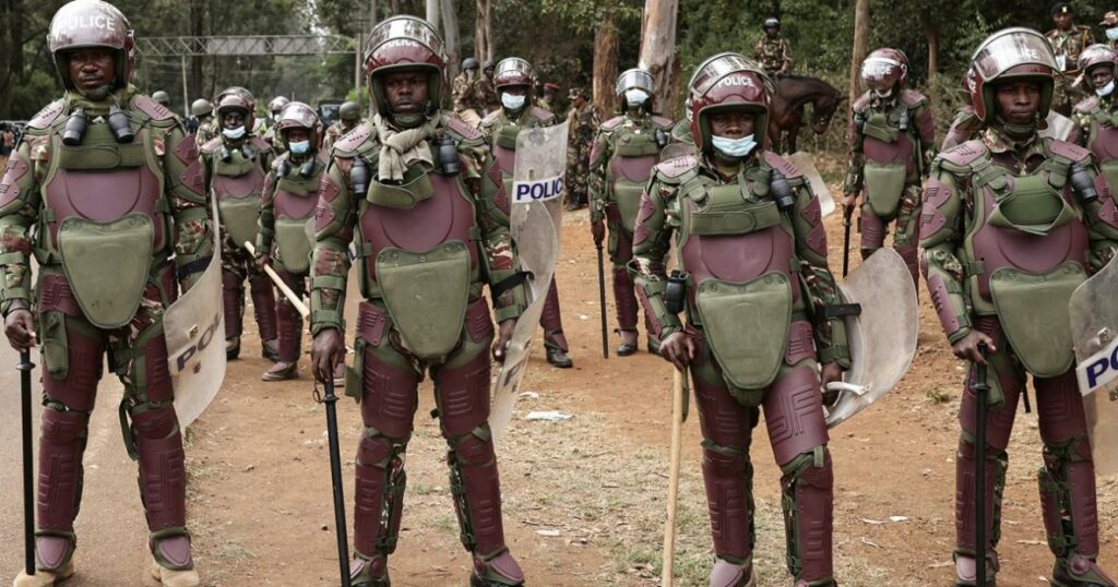 Kenyan cops in their purple riot gear.