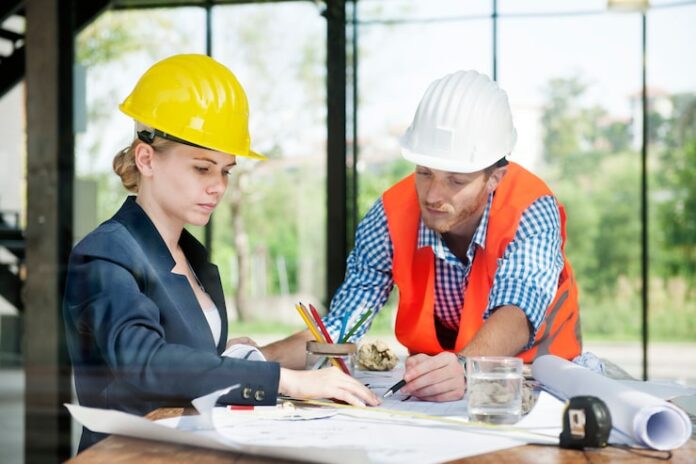architect-engineer-discussion-brainstorming-construction-concept_53876-26411-1